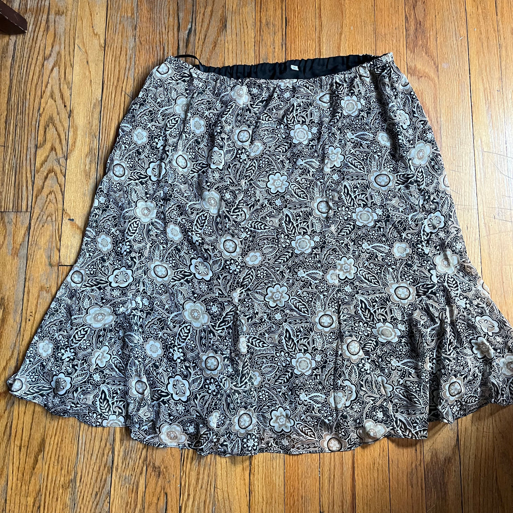 (18) Tan and black floral ruffle midi skirt