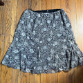 (18) Tan and black floral ruffle midi skirt
