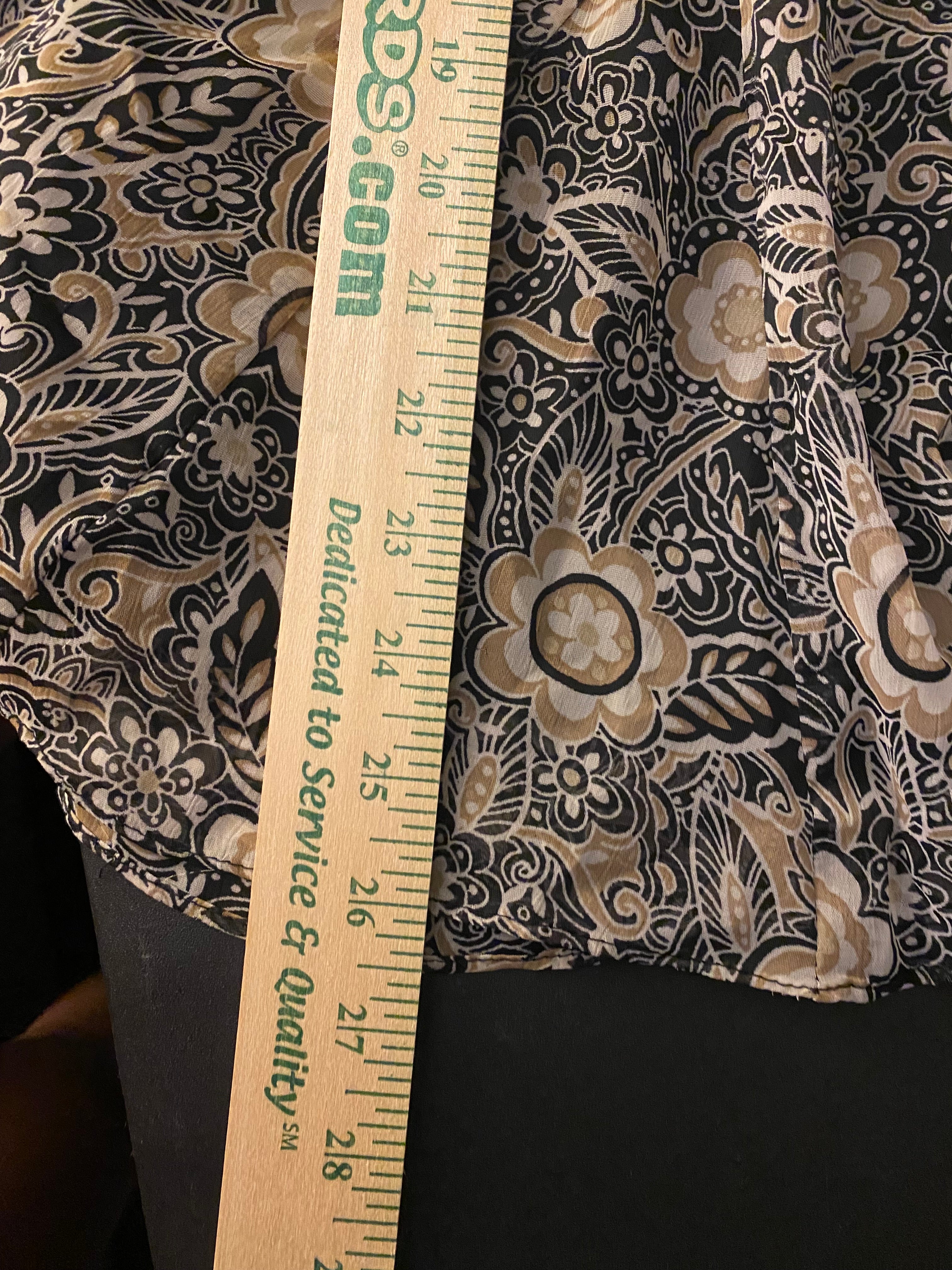 (18) Tan and black floral ruffle midi skirt